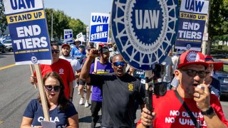 Members of the Writers Guild of America West (WGAW) join striking United Auto Workers (UAW) at a rally in front of the Stellantis Mopar facility on September 26, 2023 in Ontario, California. 