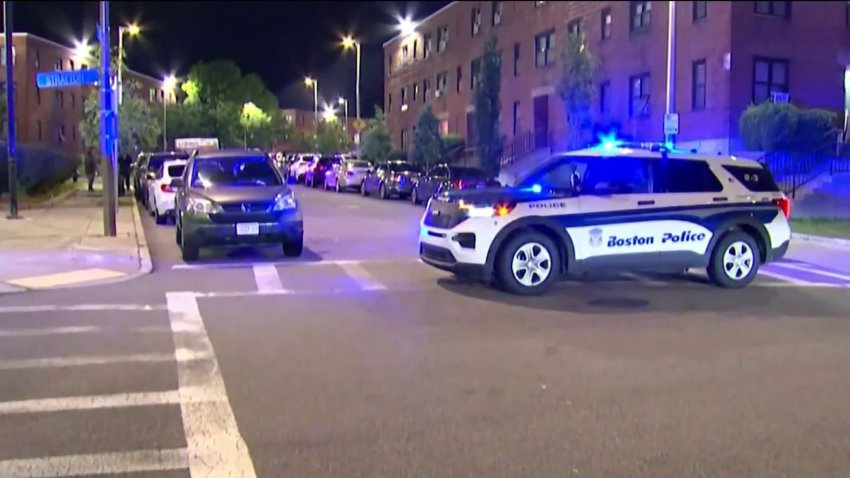 The scene on Ames Street in Boston’s Dorchester neighborhood Sunday night after five people were shot after a gathering.