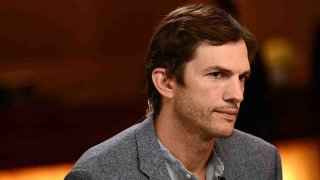 FILE - Ashton Kutcher listens during the Milken Institute Global Conference in Beverly Hills, California, on May 2, 2023.