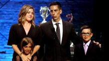 TAMPA, FLORIDA - JUNE 21: Assistant General Manager Chris Snow of the Calgary Flames with his wife Kelsie, and their children Cohen, 10, and Willa, 7 announce the Norris Trophy winner at the 2022 NHL Awards at Armature Works on June 21, 2022 in Tampa, Florida. (Photo by Mark LoMoglio/NHLI via Getty Images)