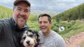 Cameron Dales (L), president and chief commercial officer of Peak Energy, and Landon Mossburg, the CEO of Peak Energy, on a hike in the earliest days of the company. The mountains of Colorado in the background inspired the name of the company, Peak Energy.