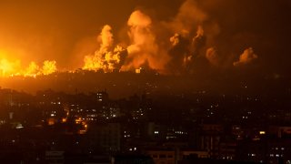 Fire and smoke rise following an Israeli airstrike