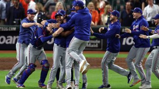 HOUSTON, TEXAS – OCTOBER 23: Jose Leclerc #25 of the Texas Rangers celebrates with his teammates after defeating the Houston Astros in Game Seven to win the American League Championship Series at Minute Maid Park on October 23, 2023 in Houston, Texas.