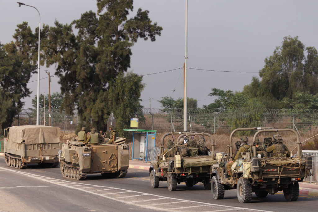 Palestinians break into Gaza UN aid warehouses as toll tops 8,000