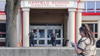 Police outside Garfield Elementary and Middle School in Revere, Massachusetts, on Friday, Oct. 27, 2023.