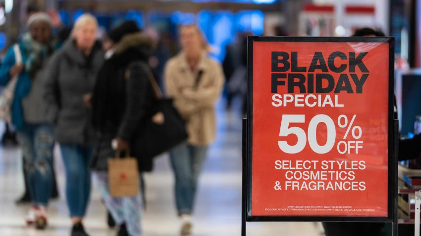 A Black Friday sale sign in the cosmetics and fragrance department of the Macy’s flagship store in New York, US, on Friday, Nov. 25, 2022.