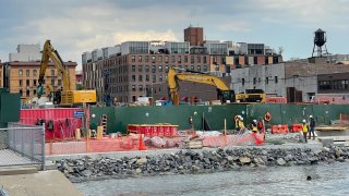 A geothermal apartment complex goes up in Brooklyn.