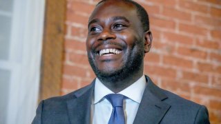 Gabe Amo smiles at an election results party after his win in the Democratic primary for Rhode Island’s 1st Congressional District, Tuesday, Sept. 5, 2023, in Pawtucket, R.I.