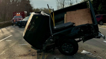 A badly damaged pickup truck in Eastham, Massachusetts, after a crash on Thursday, Nov. 30, 2023.