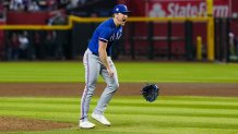 PHOENIX, AZ - NOVEMBER 01: Josh Sborz #66 of the Texas Rangers reacts after winning against the Arizona Diamondbacks in Game 5 of the 2023 World Series at Chase Field on Wednesday, November 1, 2023 in Phoenix, Arizona. The Texas Rangers won the World Series 5-0.