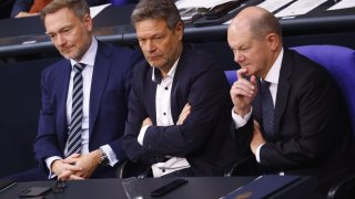 German Chancellor Olaf Scholz (SPD), Economy and Climate Action Vice Chancellor Robert Habeck (Greens) and Finance Minister Christian Lindner (FDP) listen during the Budgetary debate in the plenary hall of the German Lower house of Parliament or Bundestag on November 28, 2023 in Berlin, Germany.