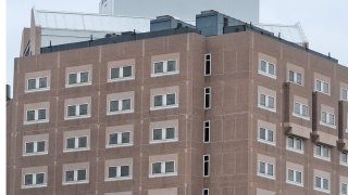 Boston, MA – Establishing shot of Suffolk County House Of Correction on Bradston St.