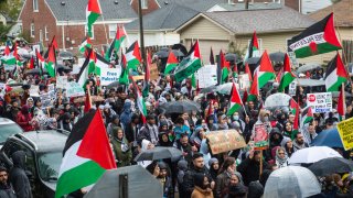 FILE - Residents of Detroit and the Arab Community of Dearborn march