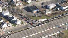 Traffic backed up on I-195 near the Washington Bridge in Providence, Rhode Island, on Tuesday, Dec. 12, 2023.