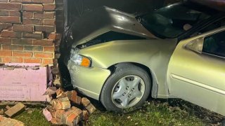 A car that crashed into a Massachusetts State Police barracks in Cheshire on Saturday, Dec. 16, 2023. A 17-year-old girl was arrested on suspicion of drunken driving.