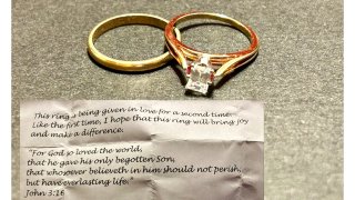 A wedding band and engagement ring were donated by an anonymous person along with a note (inset) wishing whoever they go to joy. The rings were submitted at a Salvation Army kettle outside a Market Basket in Waltham, Massachusetts.