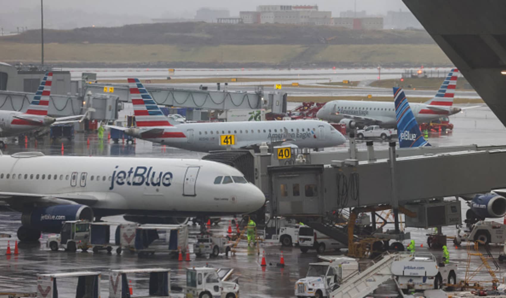 An Embraer E175LR passengers aircraft of American Eagles airlines (C) taxiing before take-off to Pittsburg is seen at La Guardia Airport on Jan. 9, 2024.