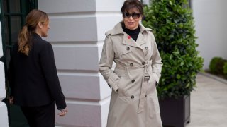Amalija Knavs, mother of first lady Melania Trump, walks out of the White House in Washington of the State Arrival Ceremony on the South Lawn, Tuesday, April 24, 2018.