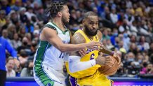 Dec 15, 2021; Dallas, Texas, USA; Los Angeles Lakers forward LeBron James (6) is fouled by Dallas Mavericks guard Jalen Brunson (13) during the second half at the American Airlines Center. Mandatory Credit: Jerome Miron-USA TODAY Sports