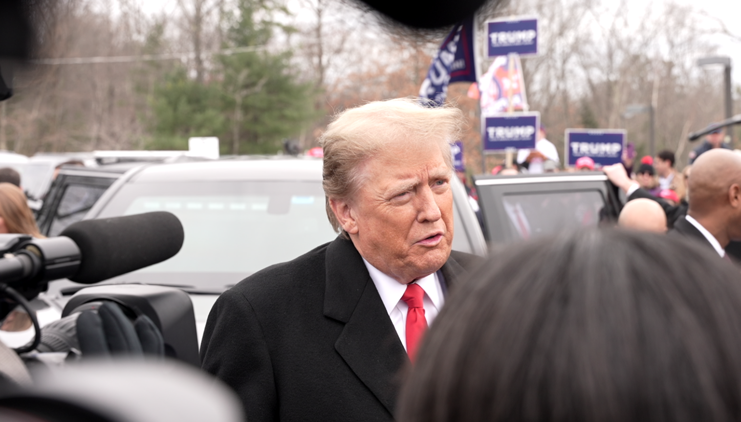 Former President Donald Trump arrives at a polling location in Londonderry, New Hampshire on Tuesday, Jan. 23, 2024.