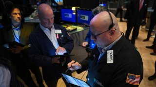 Traders work the floor during morning trading at the New York Stock Exchange ahead of the U.S. Federal Reserve’s decision on lending rates, in New York on Jan. 31, 2024.