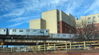 Number 4 Subway train over Cross Bronx Expressway, Bronx, New York. (Photo by: Lindsey Nicholson/UCG/Universal Images Group via Getty Images)