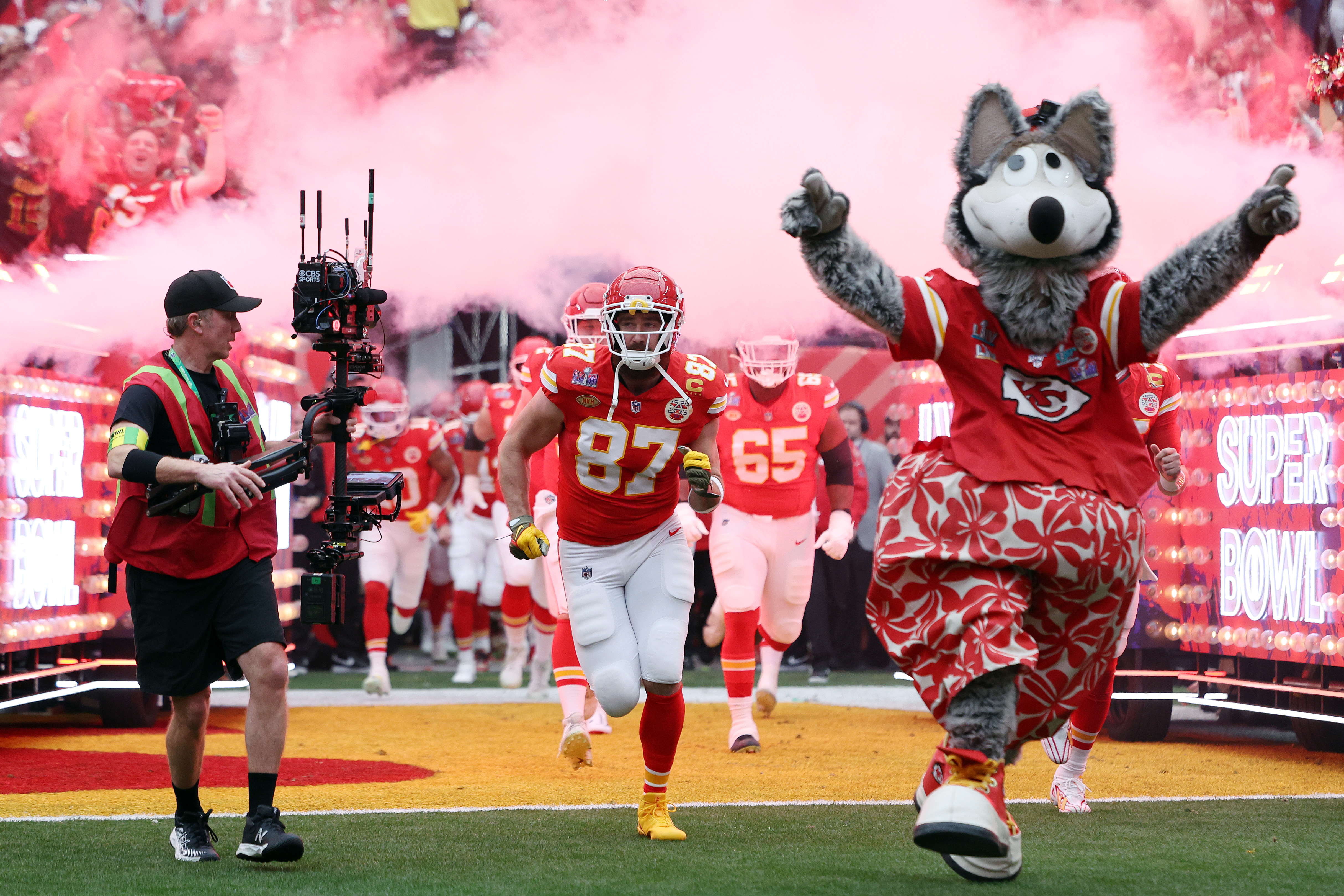 Travis Kelce #87 of the Kansas City Chiefs runs onto the field with teammates prior to Super Bowl LVIII against the San Francisco 49ers at Allegiant Stadium on February 11, 2024 in Las Vegas, Nevada.<br><em>(Photo by Jamie Squire/Getty Images)</em>