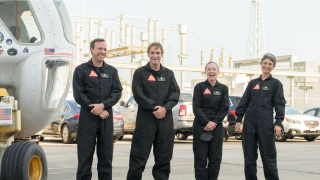 The CHAPEA mission 1 crew (from left: Nathan Jones, Ross Brockwell, Kelly Haston, Anca Selariu) exit a prototype of a pressurized rover and make their way to the CHAPEA facility ahead of their entry into the habitat on June 25, 2023.