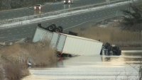 2 tractor-trailers submerged in pond after crash on I-84 in Conn.