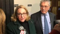 Suspended Cannabis Control Commission Chairwoman Shannon O’Brien and her lawyer, Max Stern, spoke with reporters after a Dec. 14, 2023 hearing in Suffolk Superior Court.