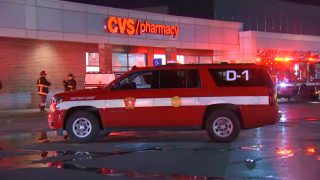 Firefighters at an East Boston CVS where a suspicious fire was reported Saturday, March 16, 2024.