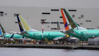 Boeing 737 MAX airplanes are pictured outside a Boeing factory on March 25, 2024 in Renton, Washington. 