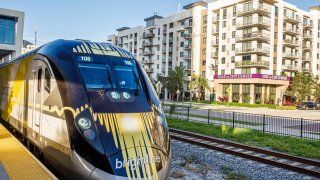 West Palm Beach, Florida, Brightline, passenger train engine on platform. 