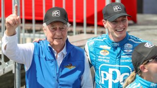 Team Penske driver Josef Newgarden, right, celebrates his victory with team owner Roger Penske after the IndyCar Grand Prix of St. Petersburg auto race, Sunday, March 10, 2024, in St. Petersburg, Fla. Team Penske suffered a humiliating disqualification Wednesday, April 24,  when reigning Indianapolis 500 winner Josef Newgarden was stripped of his victory in the season-opening race for manipulating his push-to-pass system.