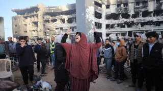 A woman mourns as the Palestinians gather around the burned and destroyed Al-Shifa Hospital after the Israeli attacks as Israeli forces withdrew from Al-Shifa hospital in Gaza City, Gaza on April 1, 2024.