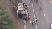 Truck rolls over, spills gravel on Route 3 in Weymouth