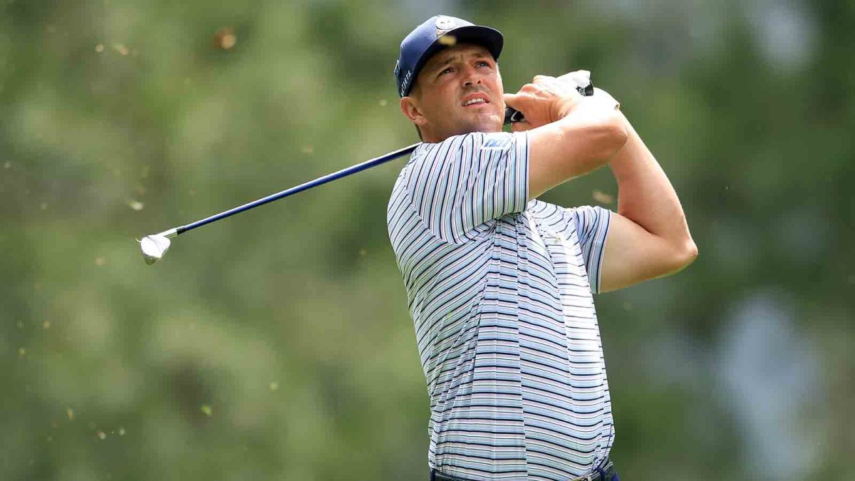 Bryson DeChambeau holds lead at Masters in suspended first round