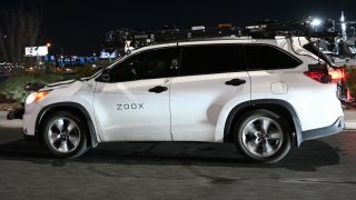 A Toyota sport-utility vehicle modified by Zoox, a subsidiary of Amazon.com, which combines radars, lidar, and cameras to test its software, drives on a road ahead of the Consumer Electronics Show (CES) of Las Vegas, Nevada on January 3, 2023.