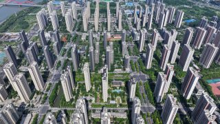 China announced “historic” steps to stabilize the crisis-hit property sector on May 17, 2024, allowing local governments to buy “some” apartments, relaxing mortgage rules and pledging to deliver unfinished homes. 