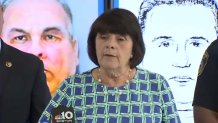 Middlesex District Attorney Marian Ryan speaks on the search for a man now suspected of raping two women at a Framingham, Massachusetts, store in 1989. Behind Ryan are police images of the suspect.