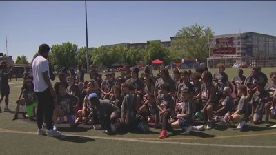 NFL players host free football camp in Everett, Mass.