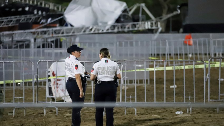 Security forces stand around a stage that collapsed due to a gust of wind during an event attended by presidential candidate Jorge Álvarez Máynez in México