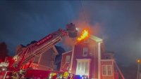 2 children rescued from house fire in Woburn