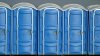 New Hampshire man charged with flipping port-a-potty with mother and child inside