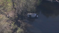 SUV crashes into Merrimack River in Lowell, driver escapes serious injury