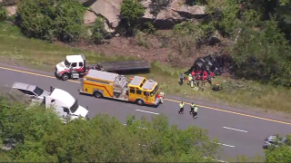 Emergency responders at the scene of a crash on I-495 in Milford, Massachusetts, on Friday, May 17, 2024.