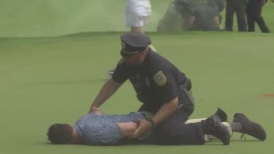 Protesters disrupt end of Travelers Championship