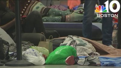 Migrant families banned from sleeping at Logan Airport