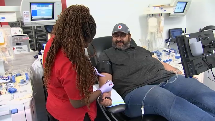 This is a photo of Anthony Soto donating blood.