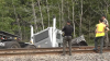 Truck driver hospitalized following collision with train in Maine